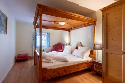 Ein Bett oder Betten in einem Zimmer der Unterkunft Alpenlodge, Ferienwohnung 8