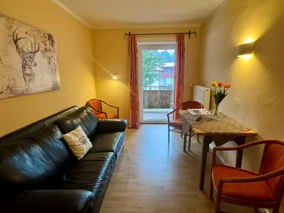 Ein Sitzbereich in der Unterkunft Alpenlodge, Ferienwohnung 11