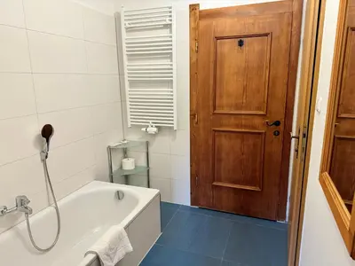 Ein Badezimmer in der Unterkunft Alpenlodge, Ferienwohnung 12