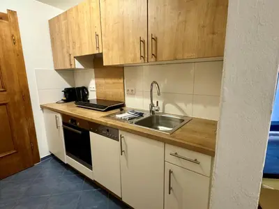 Küche/Küchenzeile in der Unterkunft Alpenlodge, Ferienwohnung 15