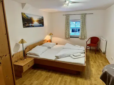 Ein Bett oder Betten in einem Zimmer der Unterkunft Alpenlodge, Ferienwohnung 17