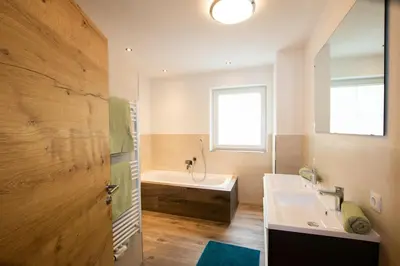 Ein Badezimmer in der Unterkunft Ferienwohnung zur Kundler Klamm by FeWo-Plan WILD010