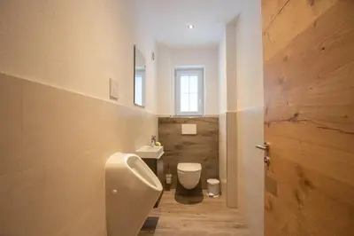 Ein Badezimmer in der Unterkunft Ferienwohnung zur Kundler Klamm by FeWo-Plan WILD011
