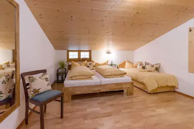 Ein Bett oder Betten in einem Zimmer der Unterkunft Ferienwohnung Gasteiger
