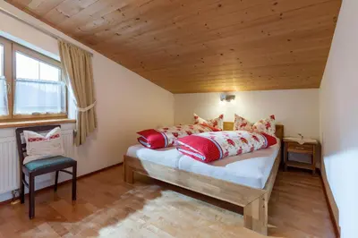 Ein Bett oder Betten in einem Zimmer der Unterkunft Ferienwohnung Gasteiger