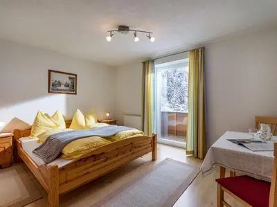 Ein Bett oder Betten in einem Zimmer der Unterkunft Haus Talblick