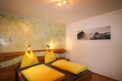 Ein Bett oder Betten in einem Zimmer der Unterkunft Gittis Ferienwohnung Panorama WILD31
