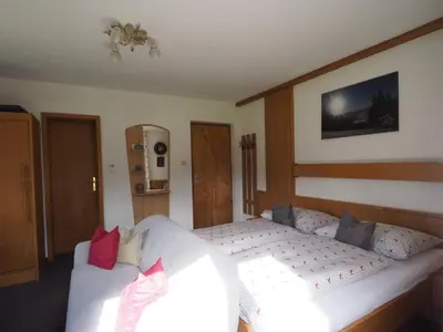 Ein Bett oder Betten in einem Zimmer der Unterkunft Gästehaus Hechenblaikner