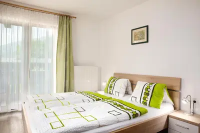 Ein Bett oder Betten in einem Zimmer der Unterkunft Ferienwohnung Schwarzenauer