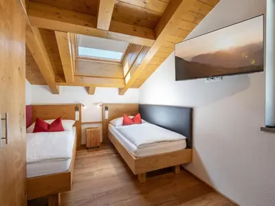 Ein Bett oder Betten in einem Zimmer der Unterkunft Ferienwohnung Schwarzenauer