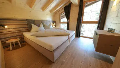 Ein Bett oder Betten in einem Zimmer der Unterkunft Montana Hochfügen