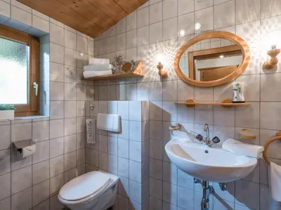 Ein Badezimmer in der Unterkunft Appartement Kaiserluft
