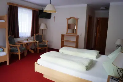 Ein Bett oder Betten in einem Zimmer der Unterkunft Landhaus St. Georg