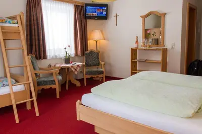 Ein Bett oder Betten in einem Zimmer der Unterkunft Landhaus St. Georg