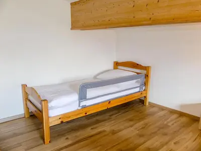 Ein Bett oder Betten in einem Zimmer der Unterkunft Apartment Haslinghof by Interhome
