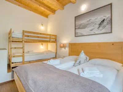 Ein Bett oder Betten in einem Zimmer der Unterkunft Chalet in Neukirchen with Mountain Views