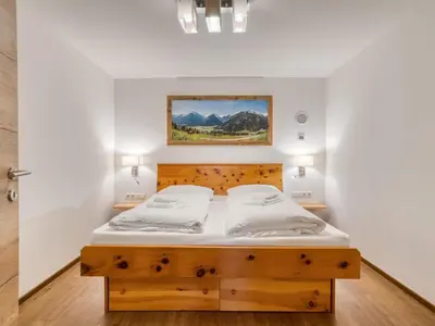Ein Bett oder Betten in einem Zimmer der Unterkunft Chalet in Neukirchen with Mountain Views