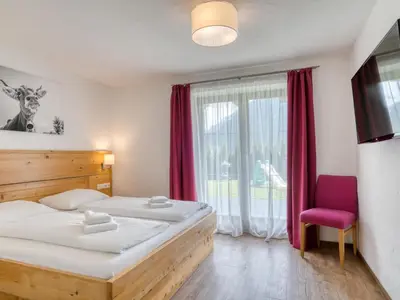 Ein Bett oder Betten in einem Zimmer der Unterkunft Chalet in Neukirchen with Mountain Views