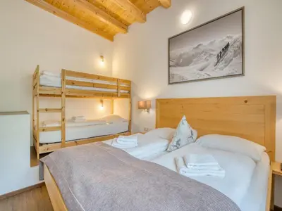 Ein Bett oder Betten in einem Zimmer der Unterkunft Apartment building Ferien, Neukirchen