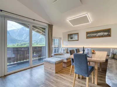 Ein Sitzbereich in der Unterkunft Apartment building Ferien, Neukirchen