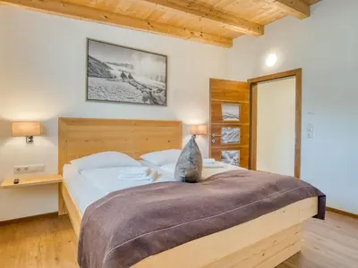 Ein Bett oder Betten in einem Zimmer der Unterkunft Holiday Home in Neukirchen with Mountain Views