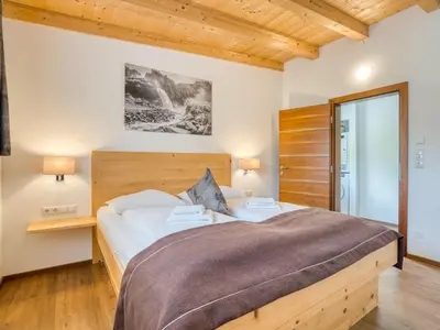 Ein Bett oder Betten in einem Zimmer der Unterkunft Holiday Home in Neukirchen with Mountain Views