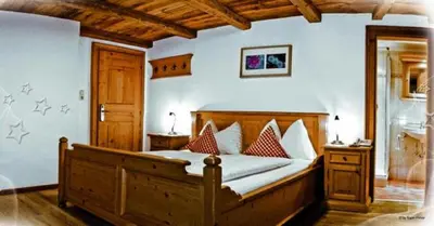 Ein Bett oder Betten in einem Zimmer der Unterkunft Landhotel Vordergrub