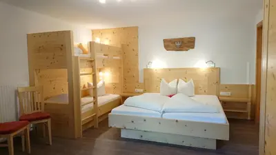 Ein Bett oder Betten in einem Zimmer der Unterkunft Ledererhof