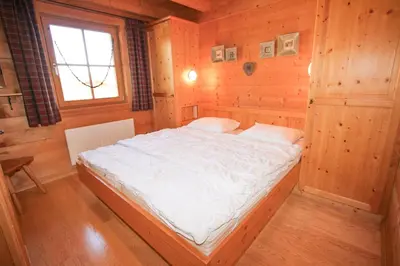 Ein Bett oder Betten in einem Zimmer der Unterkunft Chalet Königsleiten 168