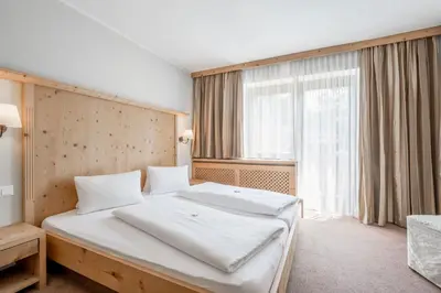 Ein Bett oder Betten in einem Zimmer der Unterkunft Gasthof Schroll