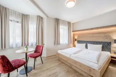 Ein Bett oder Betten in einem Zimmer der Unterkunft Gasthof Schroll