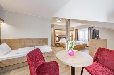 Ein Bett oder Betten in einem Zimmer der Unterkunft Gasthof Schroll