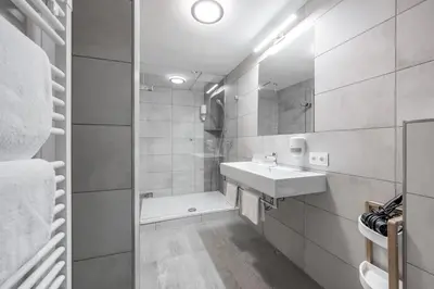 Ein Badezimmer in der Unterkunft Gasthof Schroll