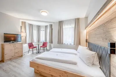 Ein Bett oder Betten in einem Zimmer der Unterkunft Gasthof Schroll