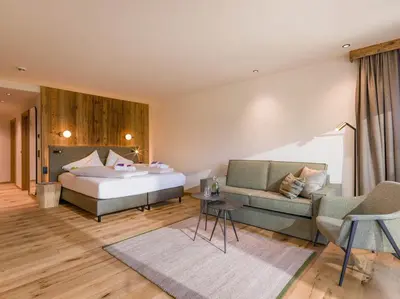 Ein Bett oder Betten in einem Zimmer der Unterkunft Hotel Penzinghof