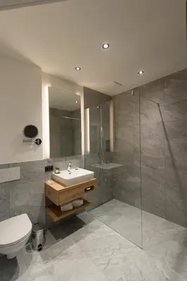 Ein Badezimmer in der Unterkunft Der Zirmhof in Saalbach - Joker Card included in summer