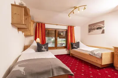 Ein Bett oder Betten in einem Zimmer der Unterkunft Haus Jochler