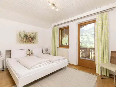 Ein Bett oder Betten in einem Zimmer der Unterkunft Beautiful Apartment in Ramsau with Balcony