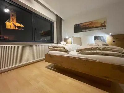 Ein Bett oder Betten in einem Zimmer der Unterkunft Absolute Active Mountain Resort