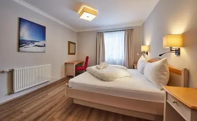 Ein Bett oder Betten in einem Zimmer der Unterkunft Hüttl Relax Appartements