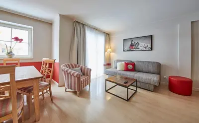 Ein Sitzbereich in der Unterkunft Hüttl Relax Appartements