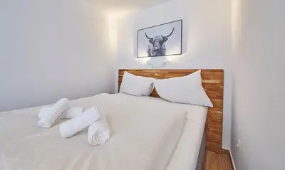Ein Bett oder Betten in einem Zimmer der Unterkunft Appartement Timeout