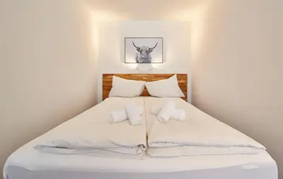 Ein Bett oder Betten in einem Zimmer der Unterkunft Appartement Timeout