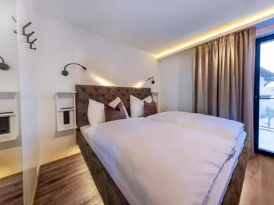 Ein Bett oder Betten in einem Zimmer der Unterkunft Apartment in Bramberg with Mountain Views
