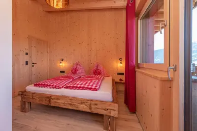 Ein Bett oder Betten in einem Zimmer der Unterkunft Heustadl Zillertal