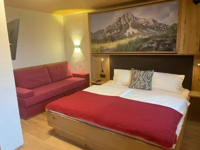 Ein Bett oder Betten in einem Zimmer der Unterkunft Pension Leamhof