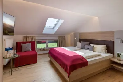 Ein Bett oder Betten in einem Zimmer der Unterkunft Pension Leamhof