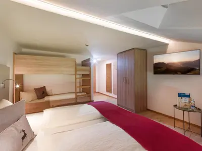 Ein Bett oder Betten in einem Zimmer der Unterkunft Pension Leamhof