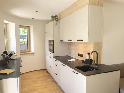 Küche/Küchenzeile in der Unterkunft Alpen Quartier