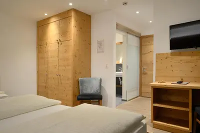 Ein Bett oder Betten in einem Zimmer der Unterkunft Hotel Platzl